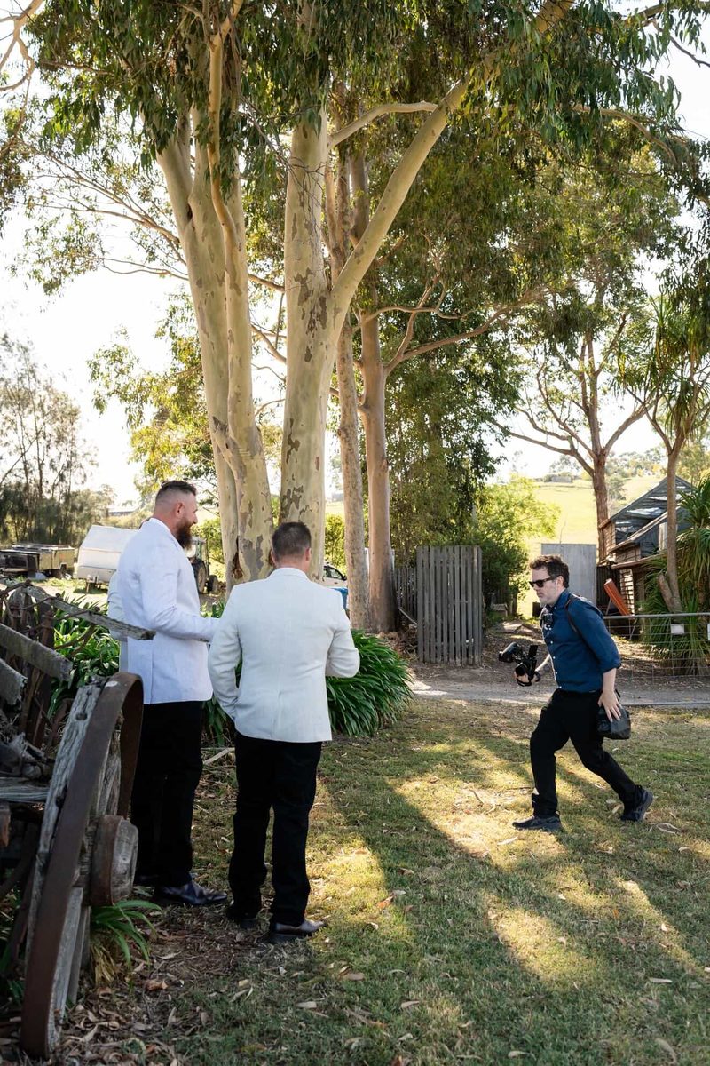 Gareth hurrying to keep up with the groomsmen